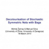 Decolourisation of Stochastic Symmetric Nets with Bags