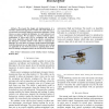 Detection and Tracking of External Features in an Urban Environment Using an Autonomous Helicopter