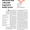 Multimodal Interaction with a Wearable Augmented Reality System