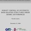 Robust control of hysteretic base-isolated structures under seismic disturbances