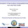 Simulation of Free Surface Compressible Flows Via a Two Fluid Model